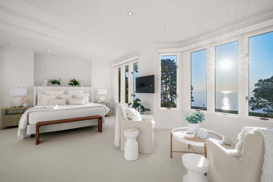 27 Ocean Bluff Drive Mashpee, MA 02649 - Photo 24 of 55 a living room with furniture and a flat screen tv