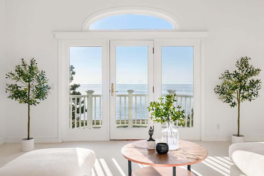 27 Ocean Bluff Drive Mashpee, MA 02649 - Photo 28 of 55 a living room with furniture and a potted plant