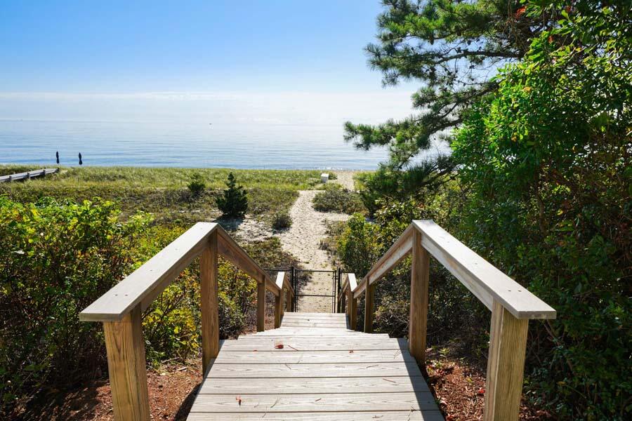 27 Ocean Bluff Drive Mashpee, MA 02649 - Photo 3 of 55 a view of a balcony with an outdoor space