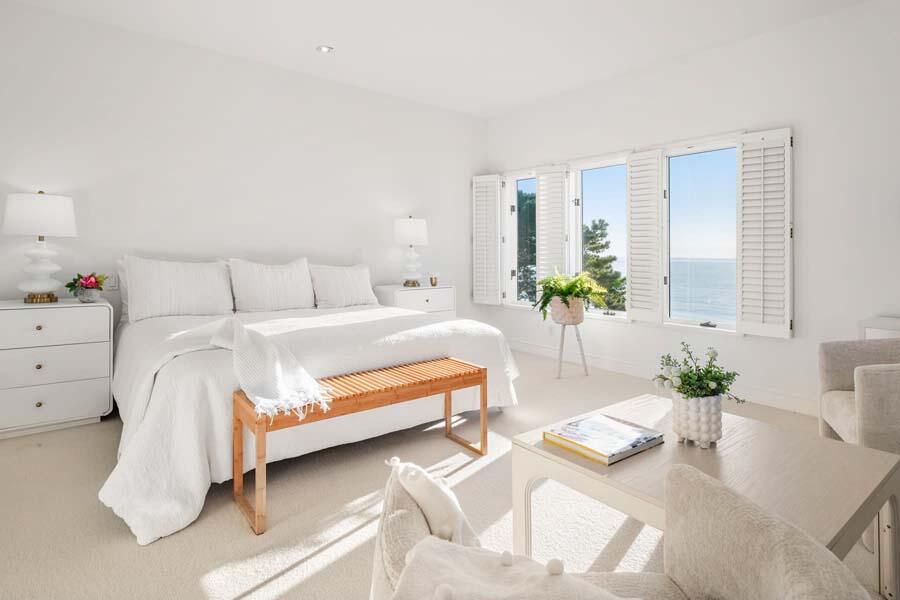 27 Ocean Bluff Drive Mashpee, MA 02649 - Photo 32 of 55 a bedroom with a bed and a couch