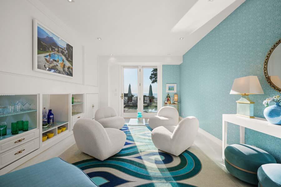 27 Ocean Bluff Drive Mashpee, MA 02649 - Photo 36 of 55 a living room with furniture and a wooden floor