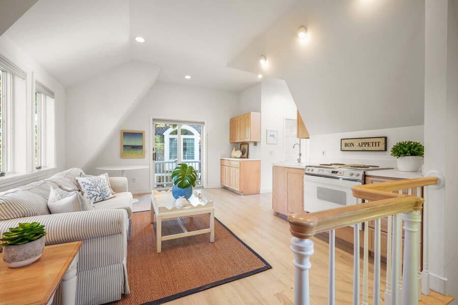 27 Ocean Bluff Drive Mashpee, MA 02649 - Photo 44 of 55 a living room with furniture and a large window