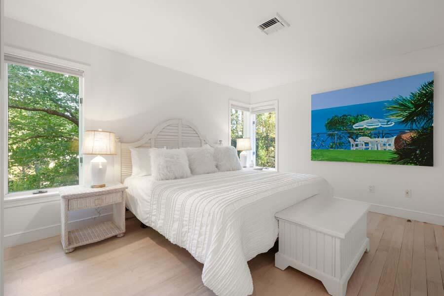 27 Ocean Bluff Drive Mashpee, MA 02649 - Photo 47 of 55 a bedroom with a bed and a window