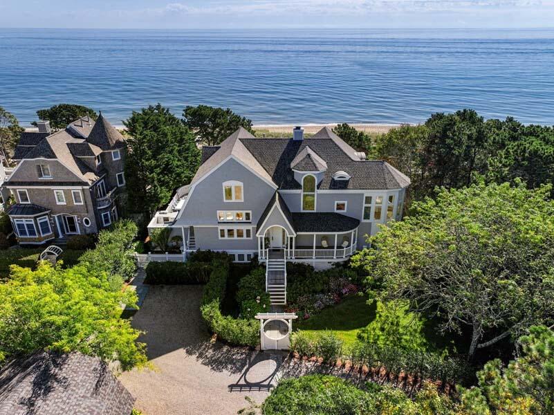 27 Ocean Bluff Drive Mashpee, MA 02649 - Photo 49 of 55 a front view of a house with a yard