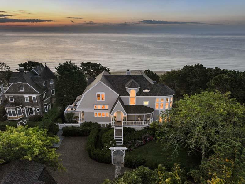 27 Ocean Bluff Drive Mashpee, MA 02649 - Photo 50 of 55 a front view of a house with a garden