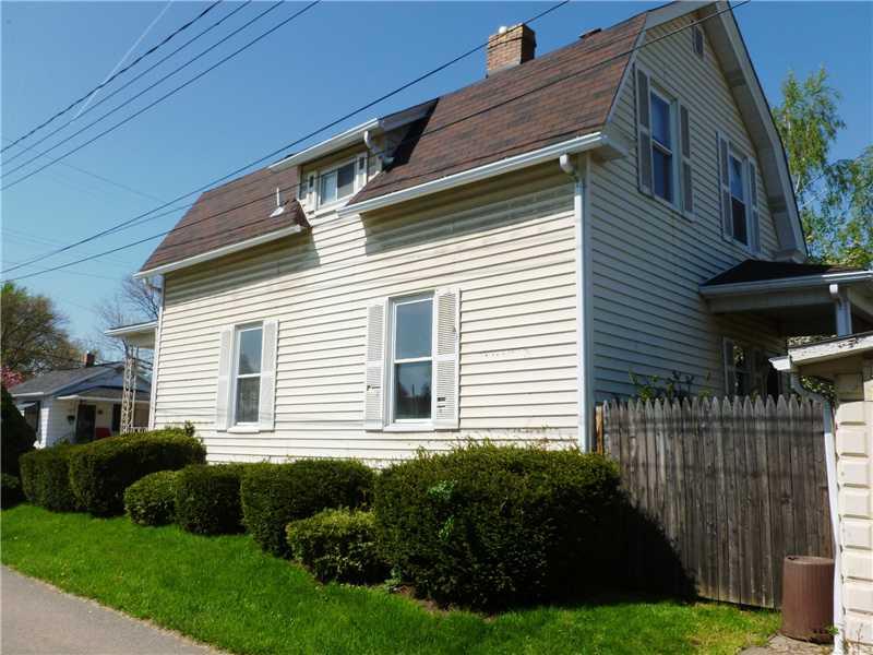 514 21st Street Beaver Falls, PA 15010 - Photo 16 of 18 Exterior Back. Nice shrubs all around house