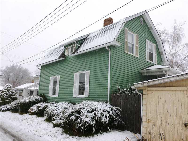 514 21st Street Beaver Falls, PA 15010 - Photo 4 of 18 Exterior Back. Shrubs around house - Nice corner lot