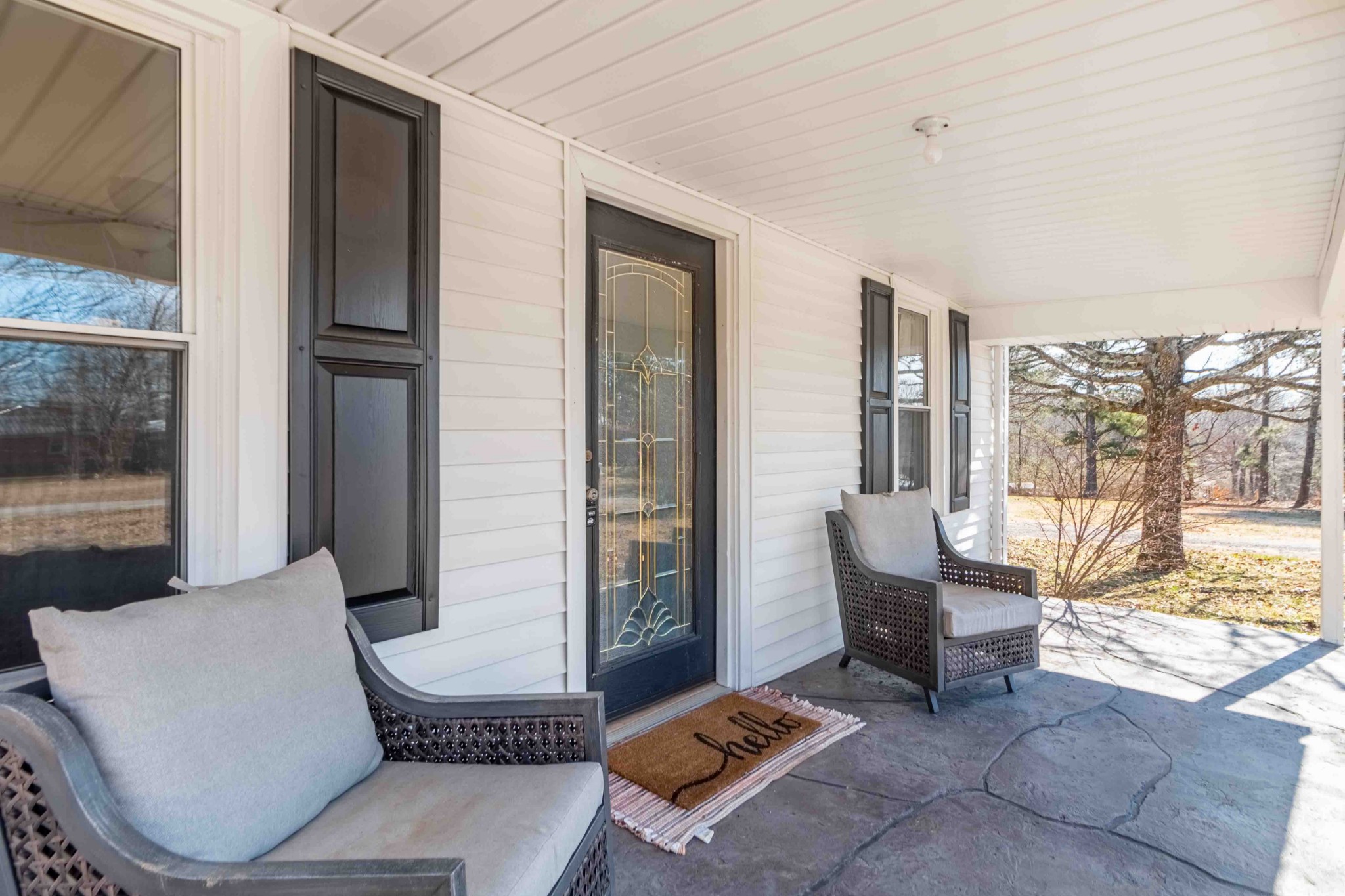 8144 Spot Light Road Lyles, TN 37098 - Photo 8 of 24 a living room with furniture and a floor to ceiling window