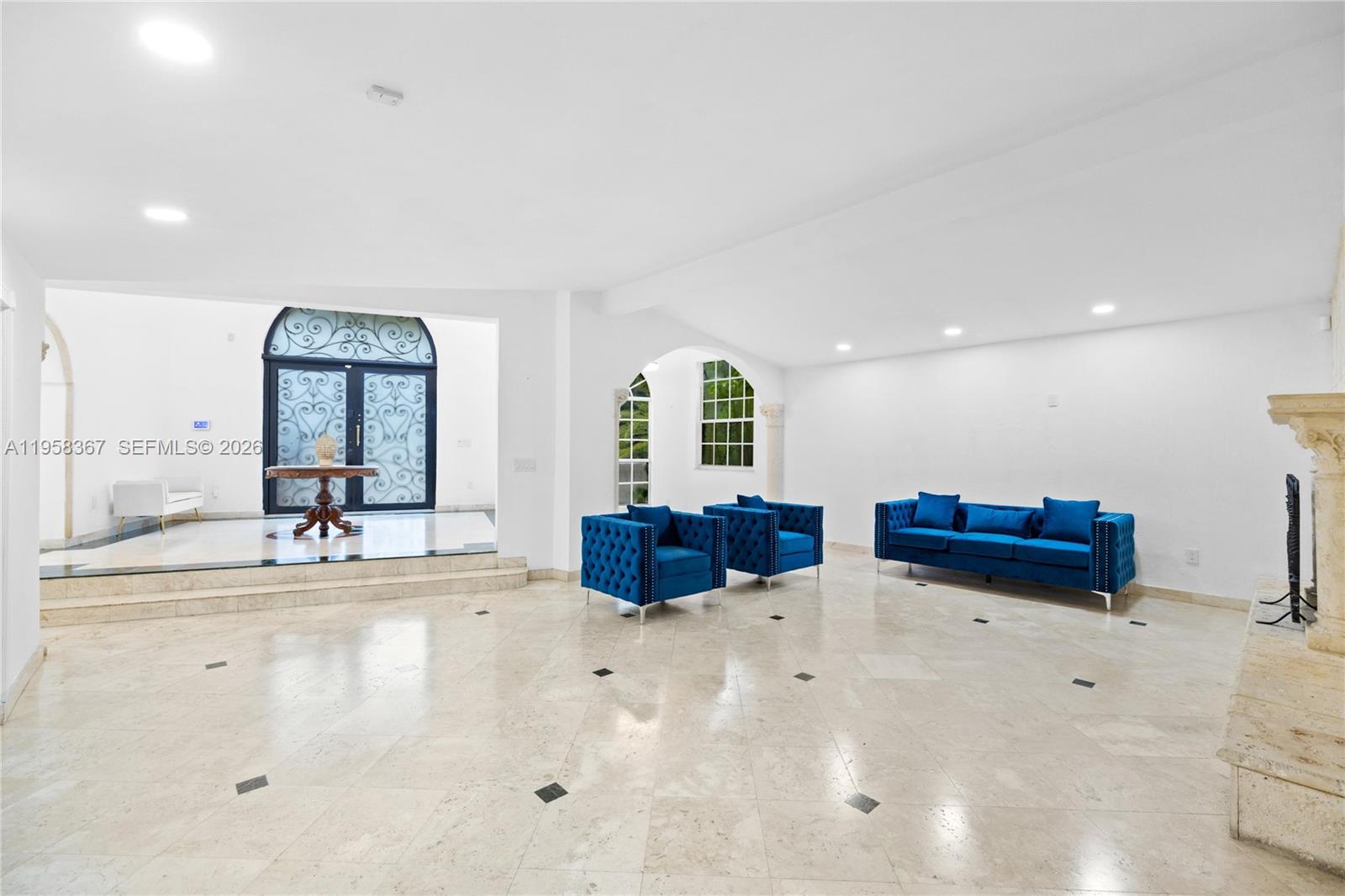 12300 Old Cutler Road, Unit 1 Pinecrest, FL 33156 - Photo 6 of 39 a living room with furniture and a large window