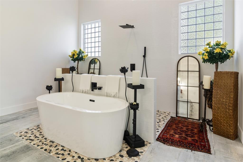 255 Private Road 5941 Emory, TX 75440 - Photo 22 of 39 Bathroom featuring hardwood / wood-style floors and independent shower and bath