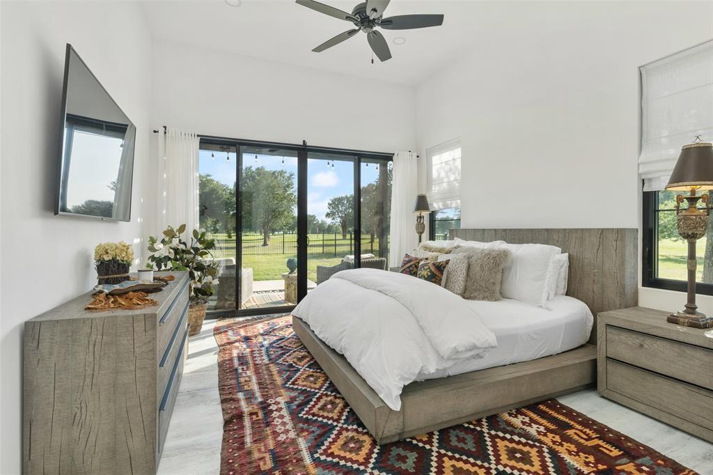 255 Private Road 5941 Emory, TX 75440 - Photo 24 of 39 Bedroom featuring access to exterior and light hardwood / wood-style floors