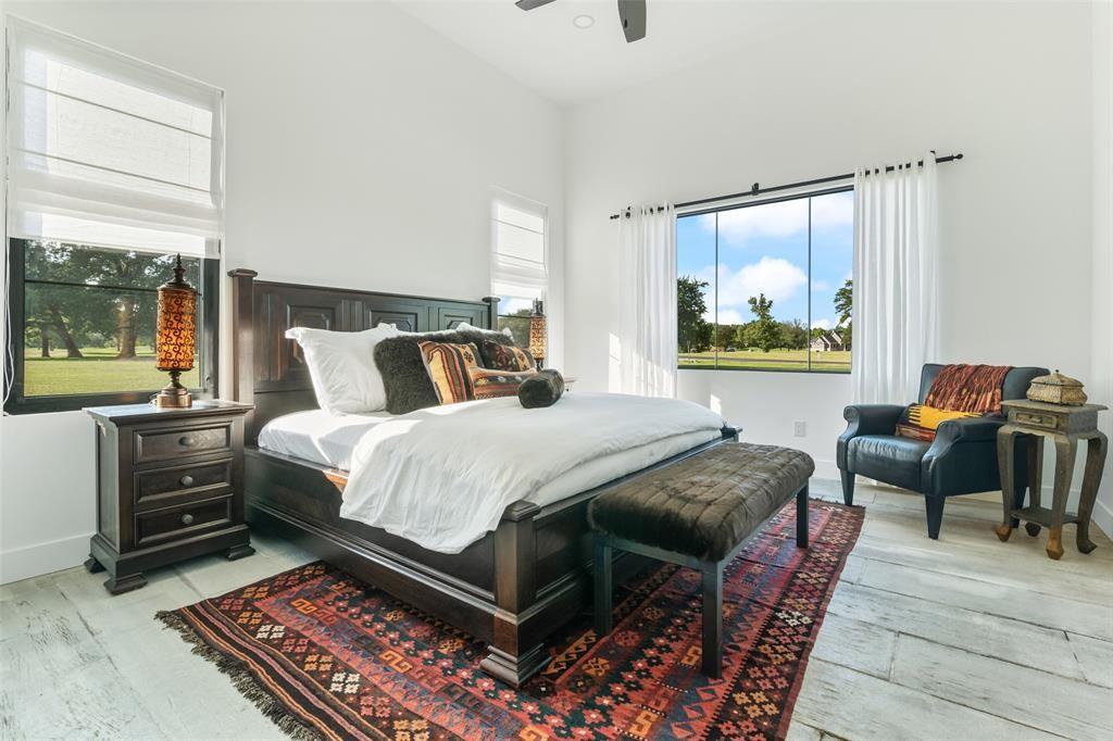 255 Private Road 5941 Emory, TX 75440 - Photo 29 of 39 Bedroom with multiple windows, ceiling fan, high vaulted ceiling, and light wood-type flooring