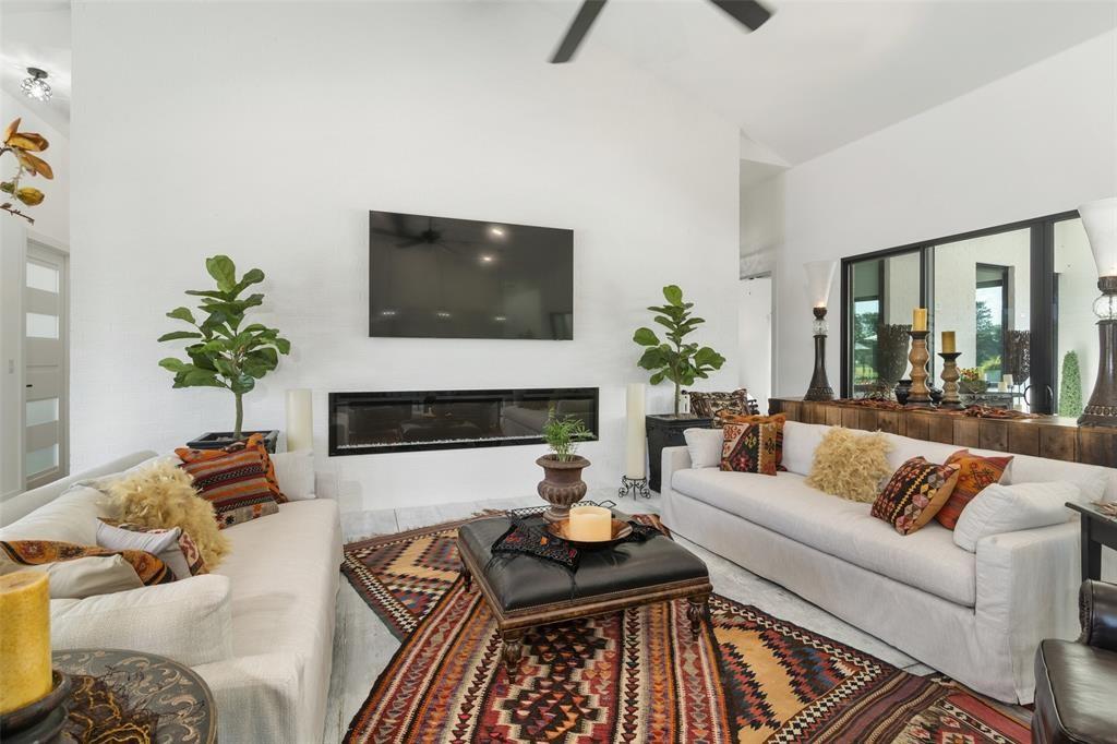 255 Private Road 5941 Emory, TX 75440 - Photo 6 of 39 Living room featuring high vaulted ceiling and ceiling fan