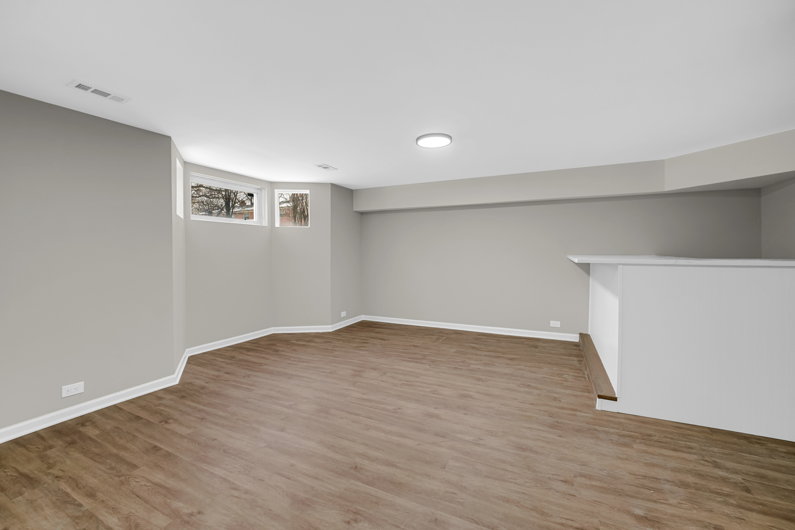 1602 West 103rd Street Chicago, IL 60643 - Photo 19 of 22 a view of an empty room with wooden floor and closet