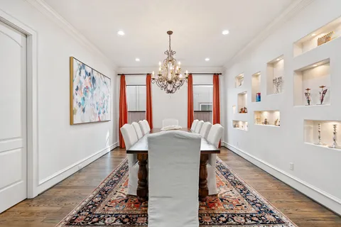 a dining room with wooden floor