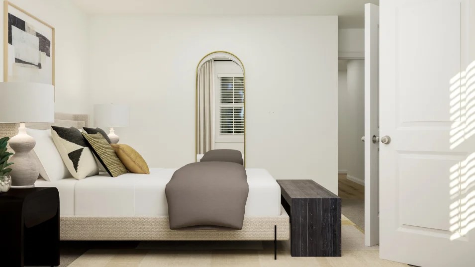 18013 Prairie Falcon Way Pflugerville, TX 78660 - Photo 4 of 22 a bedroom with bed and wooden floor