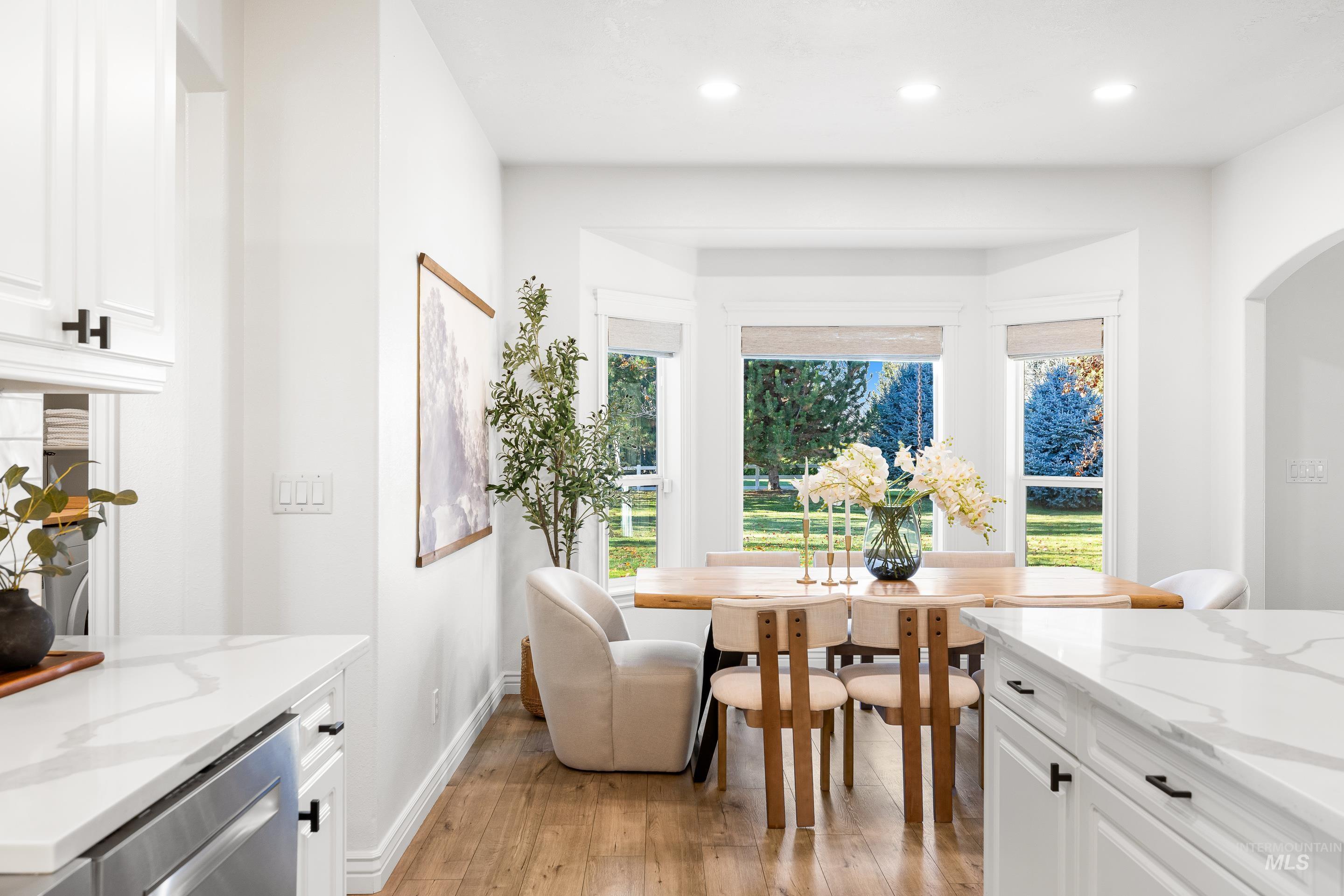 1197 North Cove Colony Way Eagle, ID 83616 - Photo 25 of 50 Dining room featuring light wood-style flooring and recessed lighting