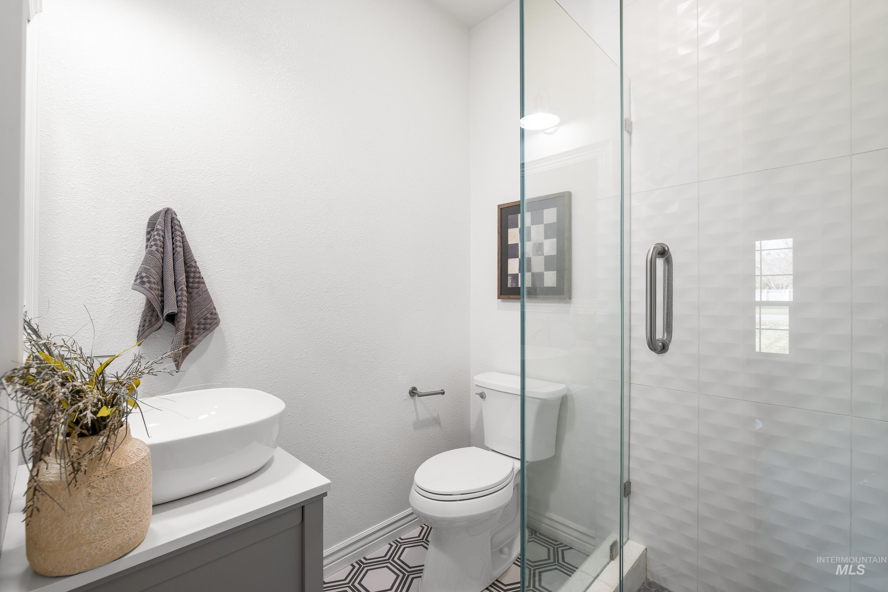 1197 North Cove Colony Way Eagle, ID 83616 - Photo 35 of 50 Full bathroom featuring vanity and a shower stall