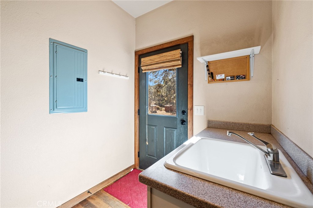 59331 Devils Ladder Road Mountain Center, CA 92561 - Photo 24 of 74 a bathroom with a sink and a mirror