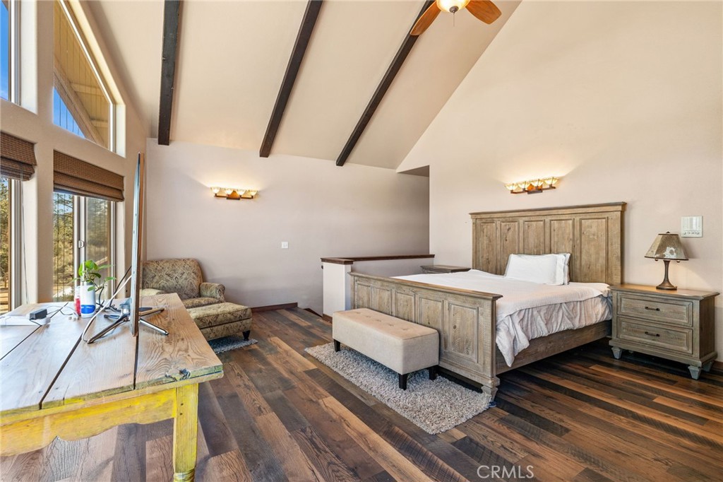 59331 Devils Ladder Road Mountain Center, CA 92561 - Photo 28 of 74 a bed room with a bed and a couch