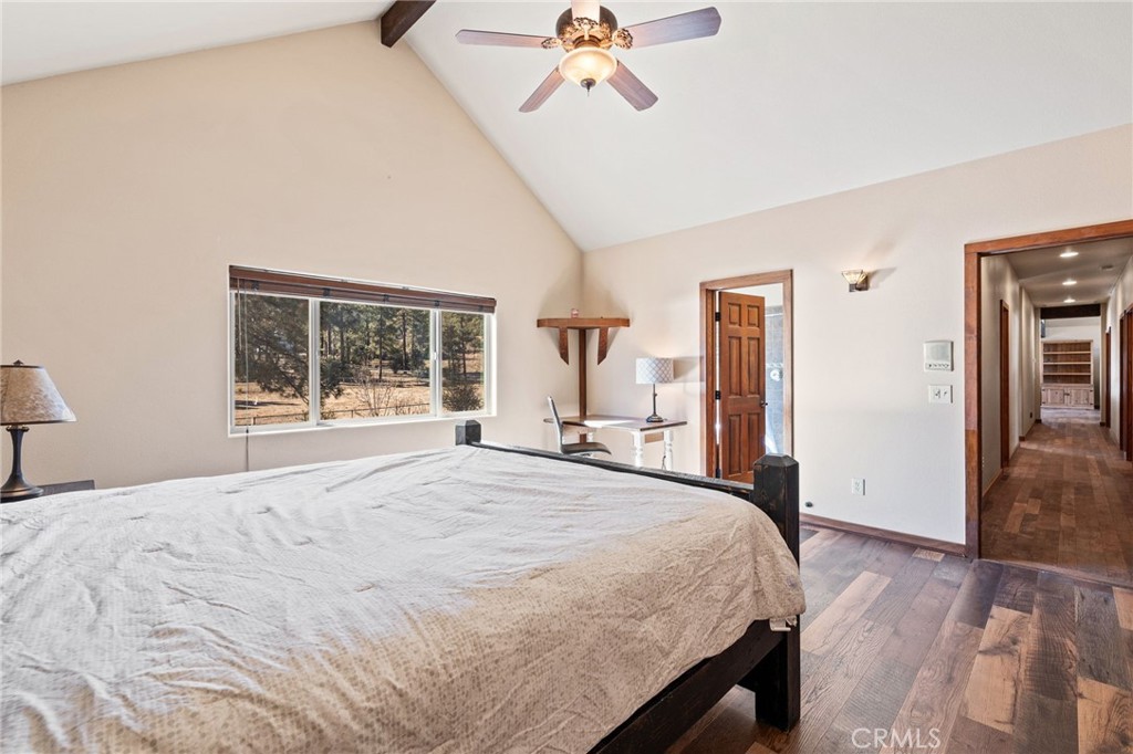 59331 Devils Ladder Road Mountain Center, CA 92561 - Photo 31 of 74 a bedroom with a large bed and a window