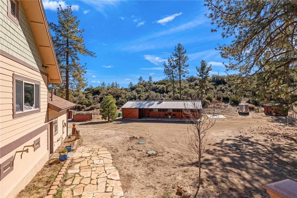59331 Devils Ladder Road Mountain Center, CA 92561 - Photo 43 of 74 a view of a backyard of the house