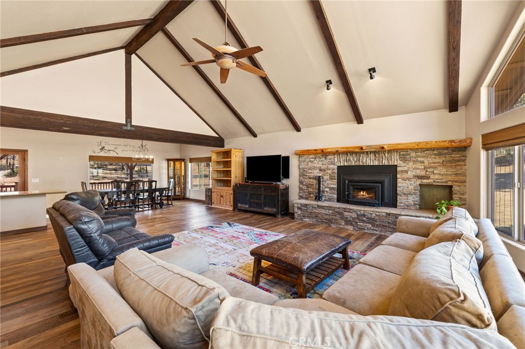 59331 Devils Ladder Road Mountain Center, CA 92561 - Photo 10 of 74 a living room with furniture and a fireplace