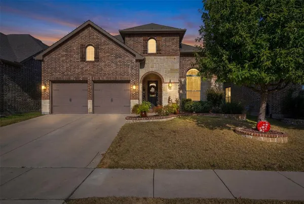 a front view of a house with entertaining space