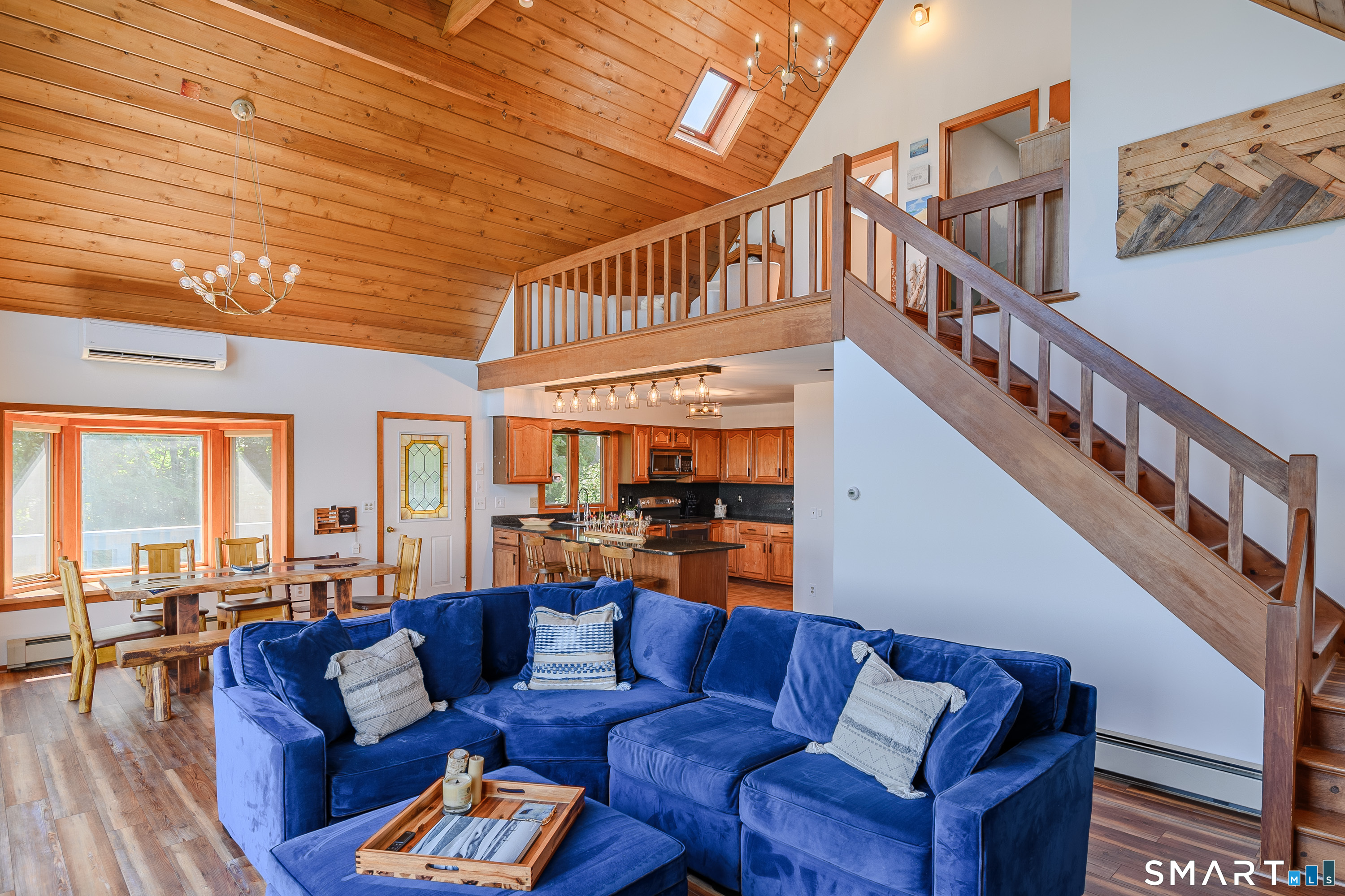 3 Spring Wood Lane New Fairfield, CT 06812 - Photo 13 of 28 a living room with furniture and a large window