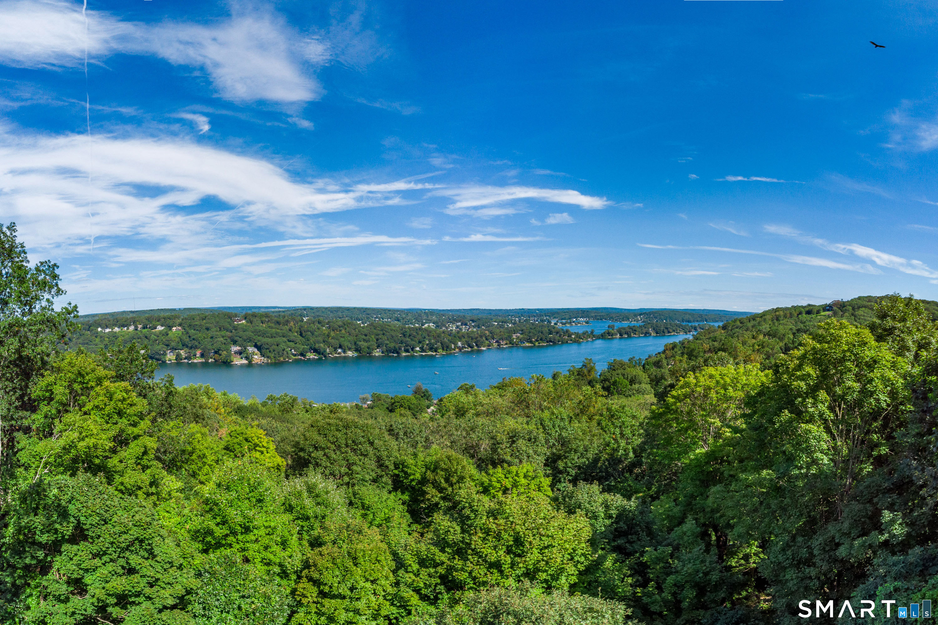 3 Spring Wood Lane New Fairfield, CT 06812 - Photo 17 of 28 a view of a lake with a yard