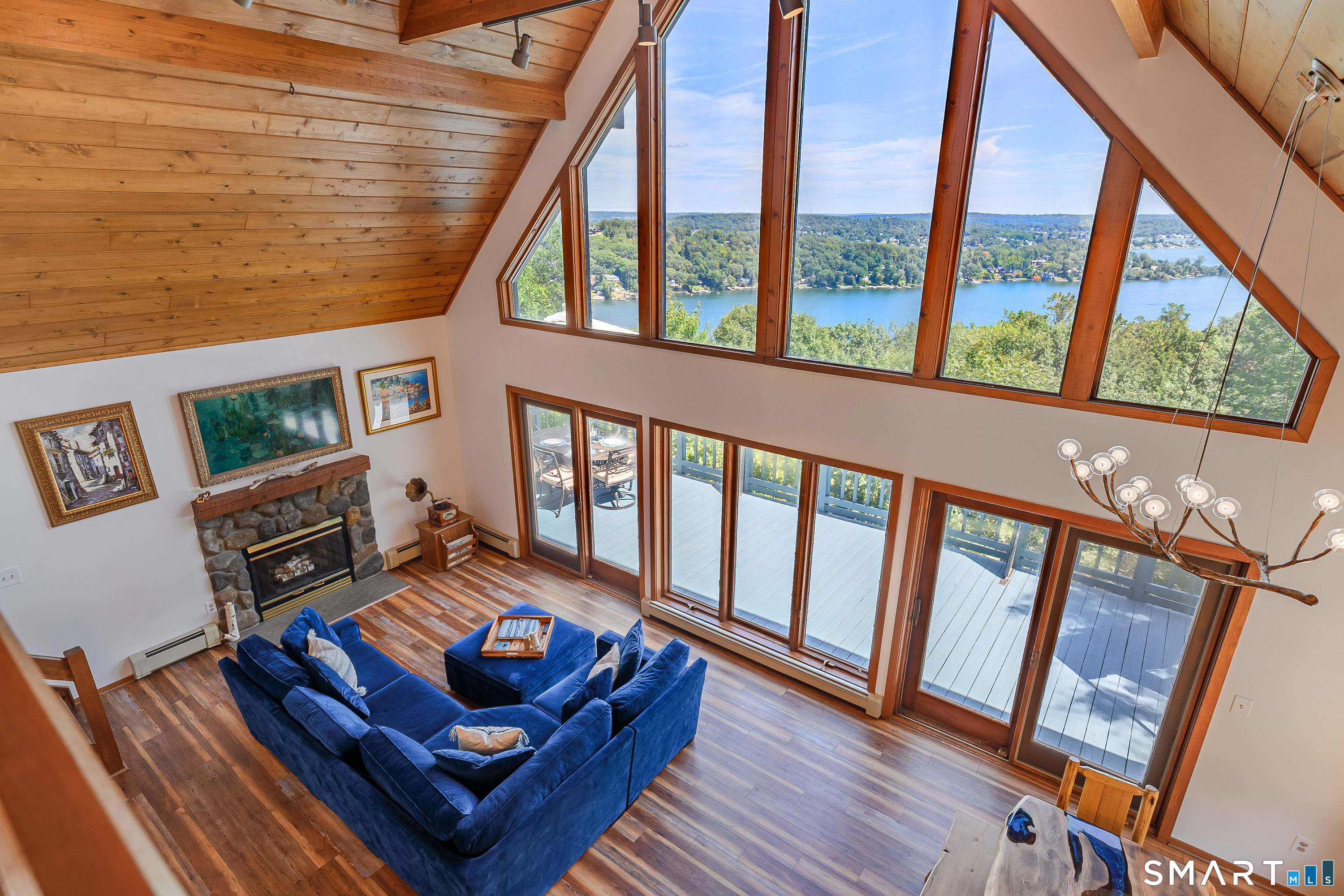 3 Spring Wood Lane New Fairfield, CT 06812 - Photo 2 of 28 a living room with furniture and a floor to ceiling window