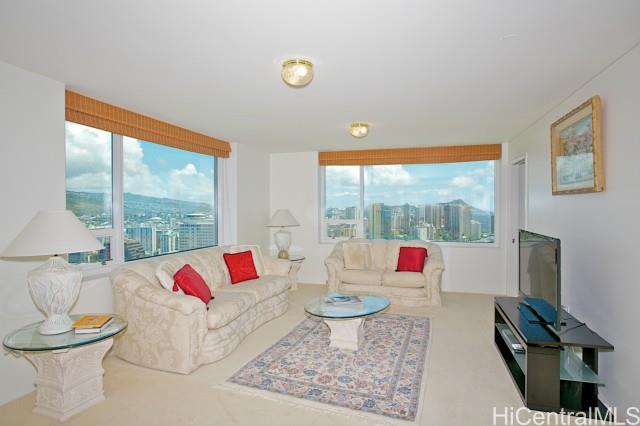 88 Piikoi Street, Unit 3604 Honolulu, HI 96814 - Photo 1 of 1 a living room with furniture and a large window