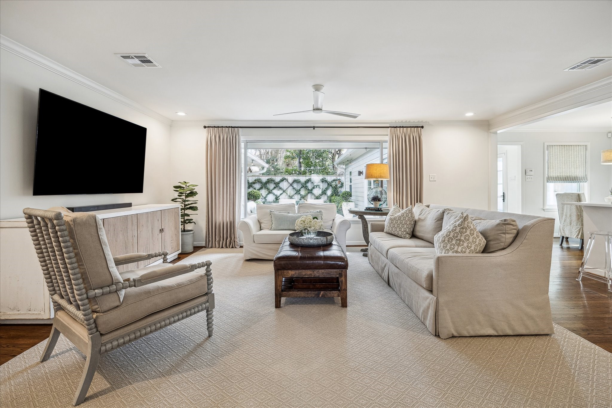 5655 Overbrook Lane Houston, TX 77056 - Photo 15 of 36 Family room with beautiful picture window overlooking the recently reimagined backyard!