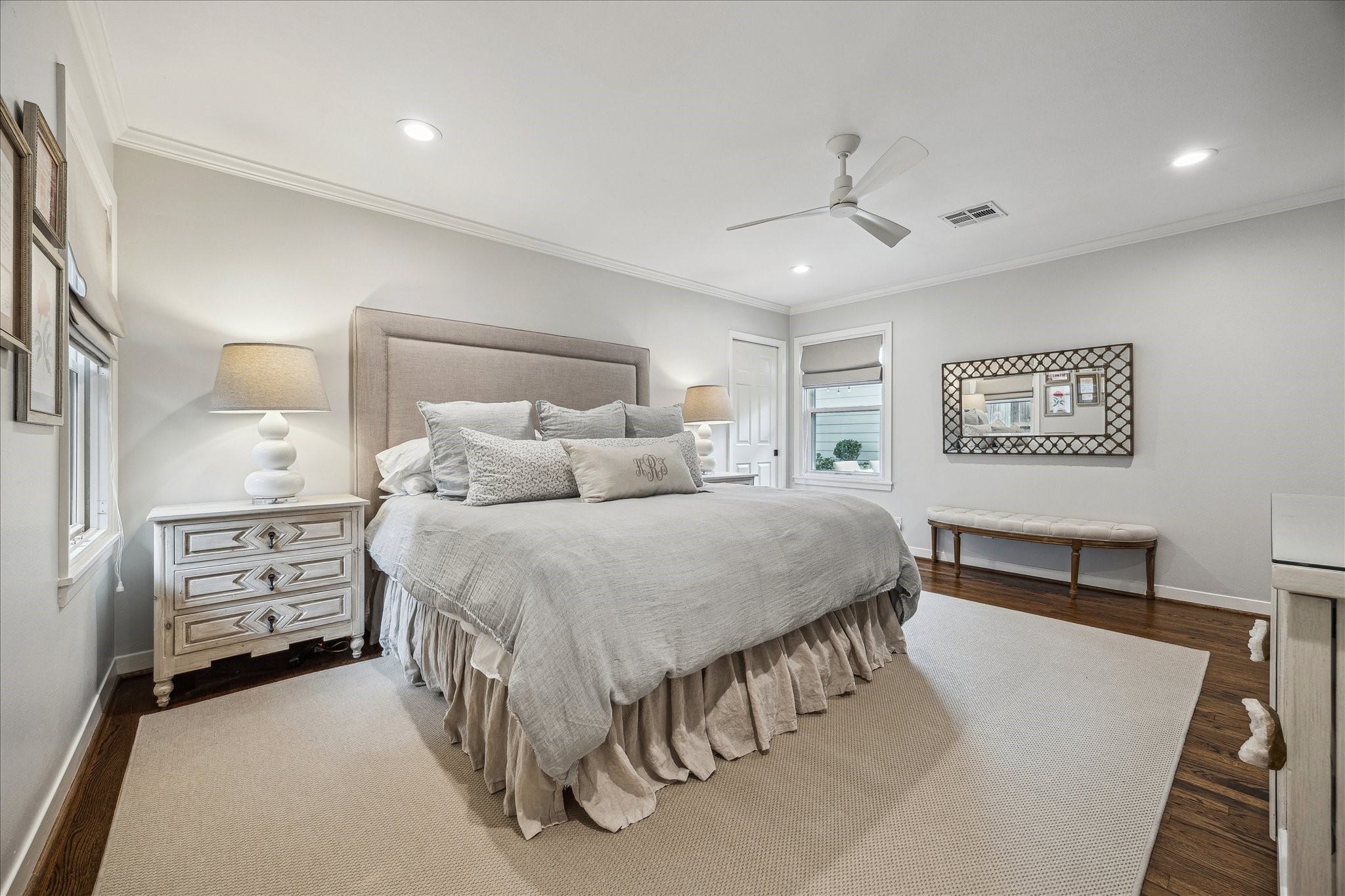 5655 Overbrook Lane Houston, TX 77056 - Photo 23 of 36 Primary bedroom with hardwood floors, and large walk-in closet (not pictured) which was added on by the current owner.