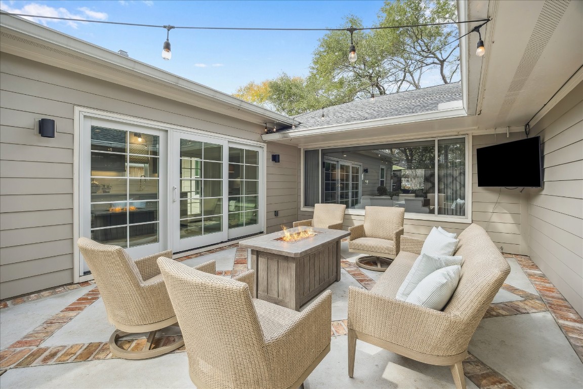 5655 Overbrook Lane Houston, TX 77056 - Photo 30 of 36 Cafe lights make this the most charming space for outdoor entertaining.