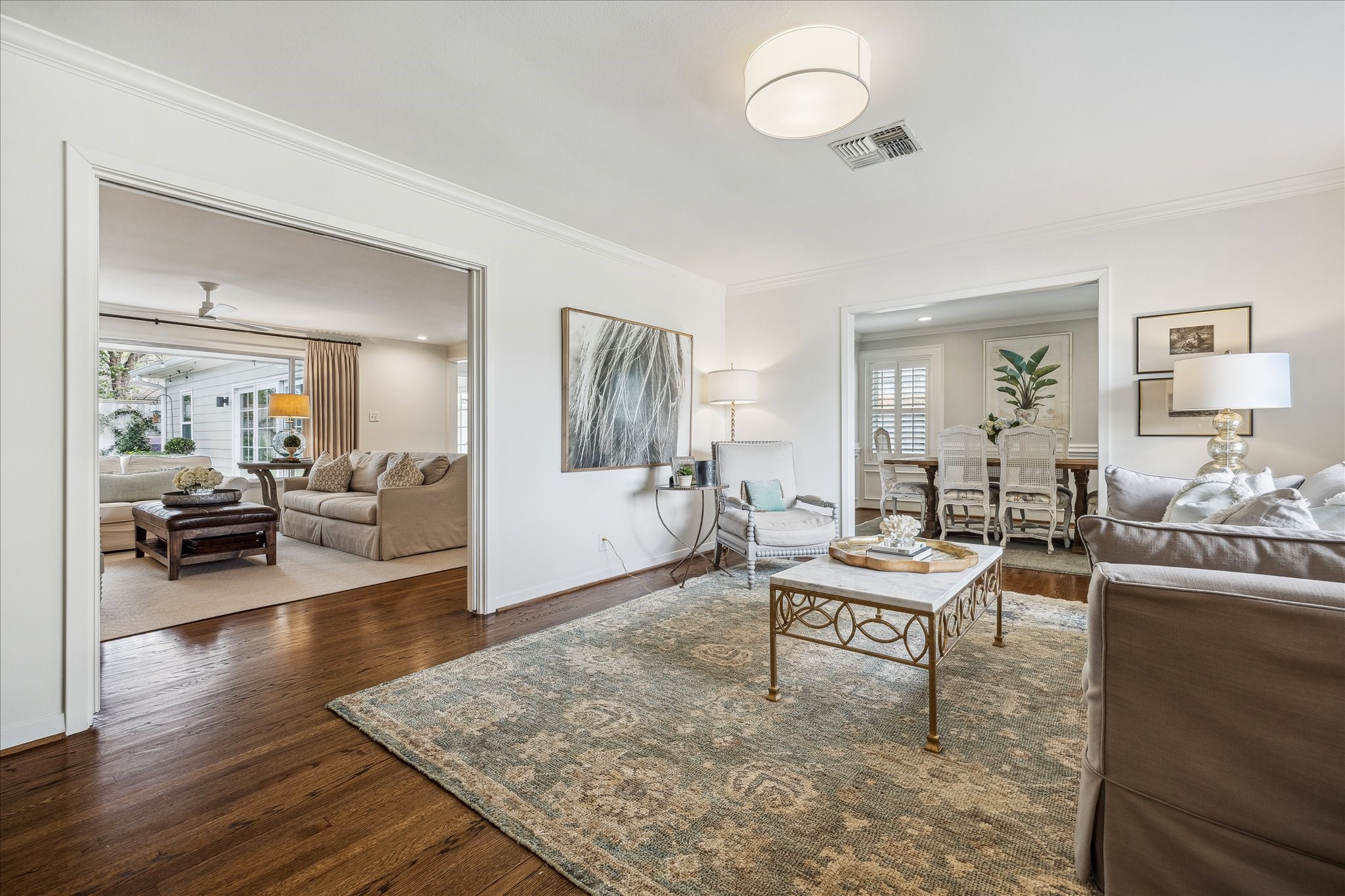 5655 Overbrook Lane Houston, TX 77056 - Photo 7 of 36 Additional view of formal living room open to dining room and family room.