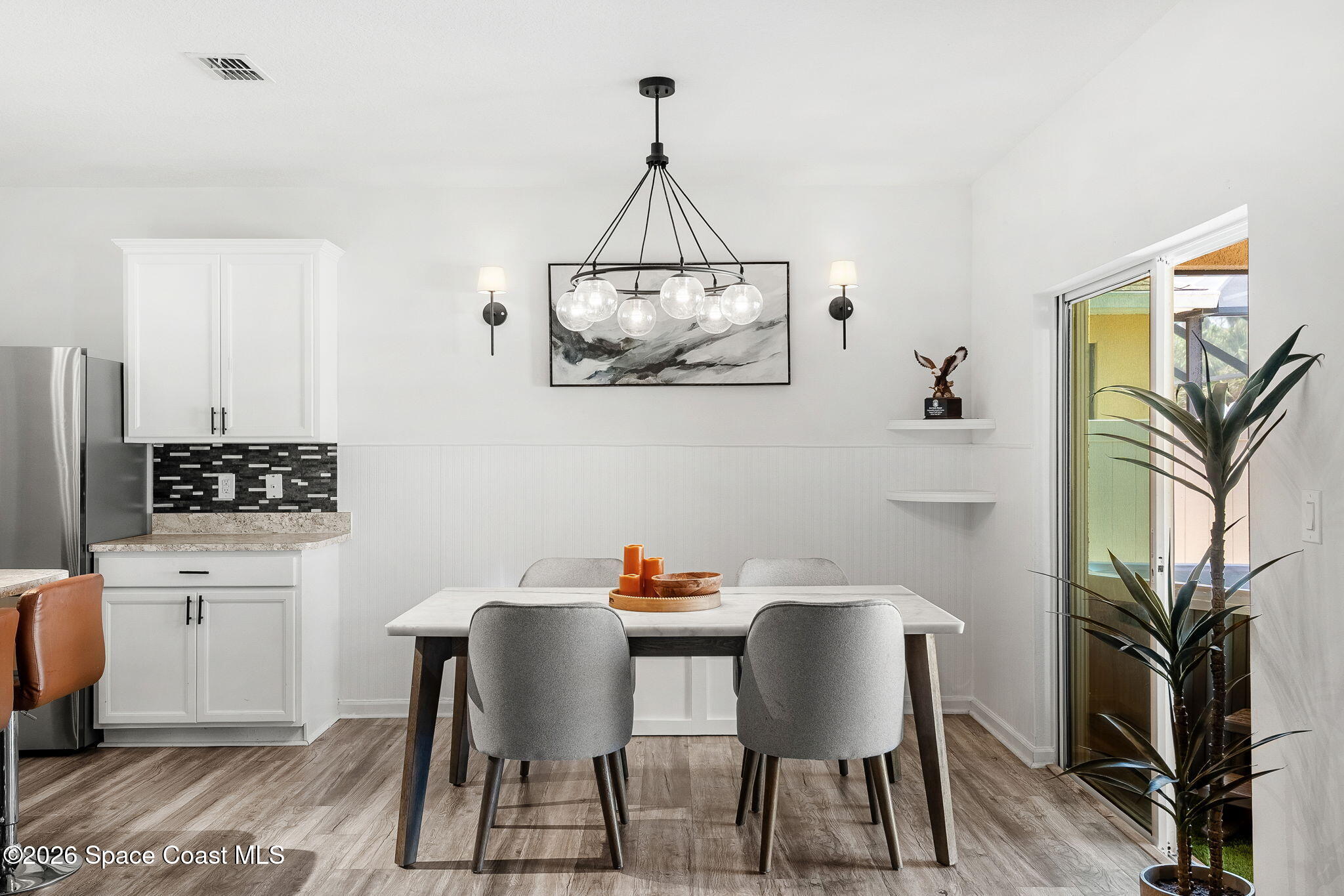 202 Alamere Drive Southwest Palm Bay, FL 32908 - Photo 12 of 36 Gather around the Table