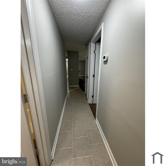 3361 Yost Lane, Unit 103 Dumfries, VA 22026 - Photo 10 of 10 a view of hallway with windows