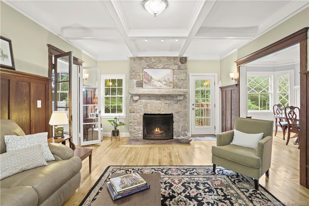 319 Wilton Road West Ridgefield, CT 06877 - Photo 1 of 1 a living room with furniture and a fireplace