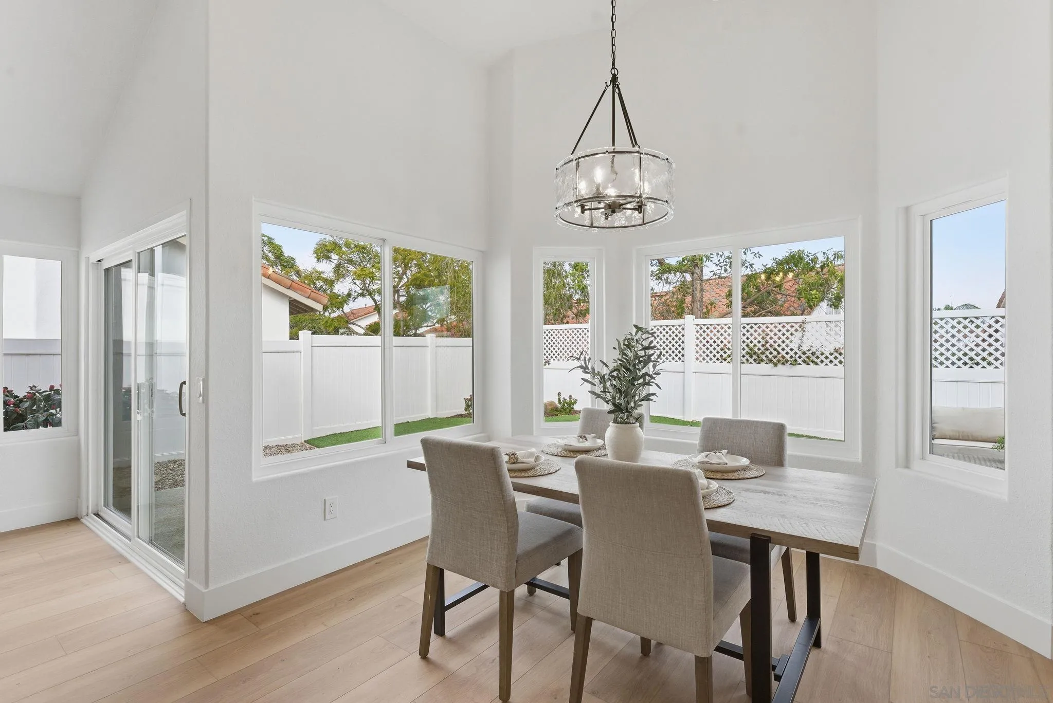 4744 Agora Way Oceanside, CA 92056 - Photo 14 of 31 a view of a dining room with furniture window and wooden floor