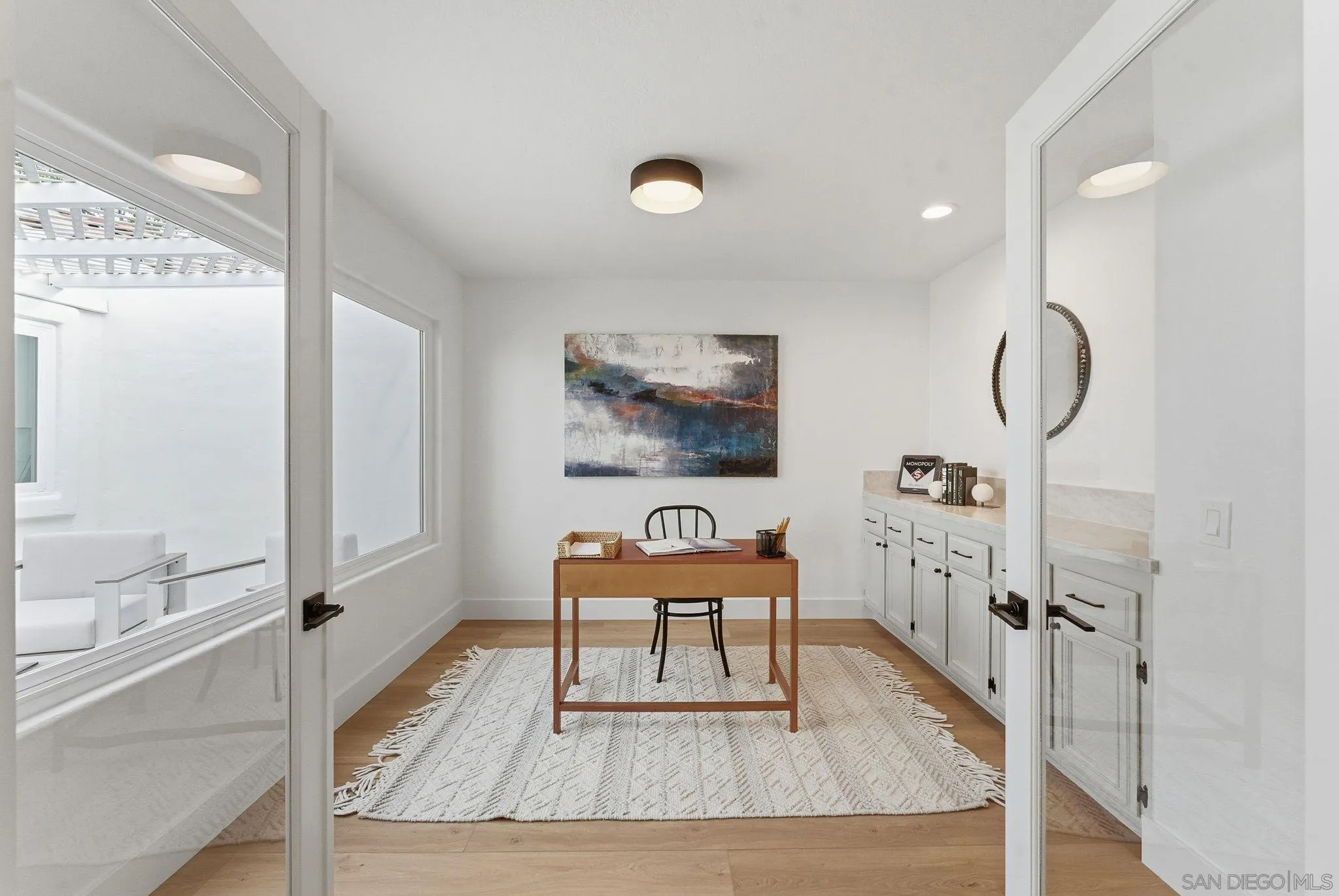 4744 Agora Way Oceanside, CA 92056 - Photo 16 of 31 a living room with furniture and a rug