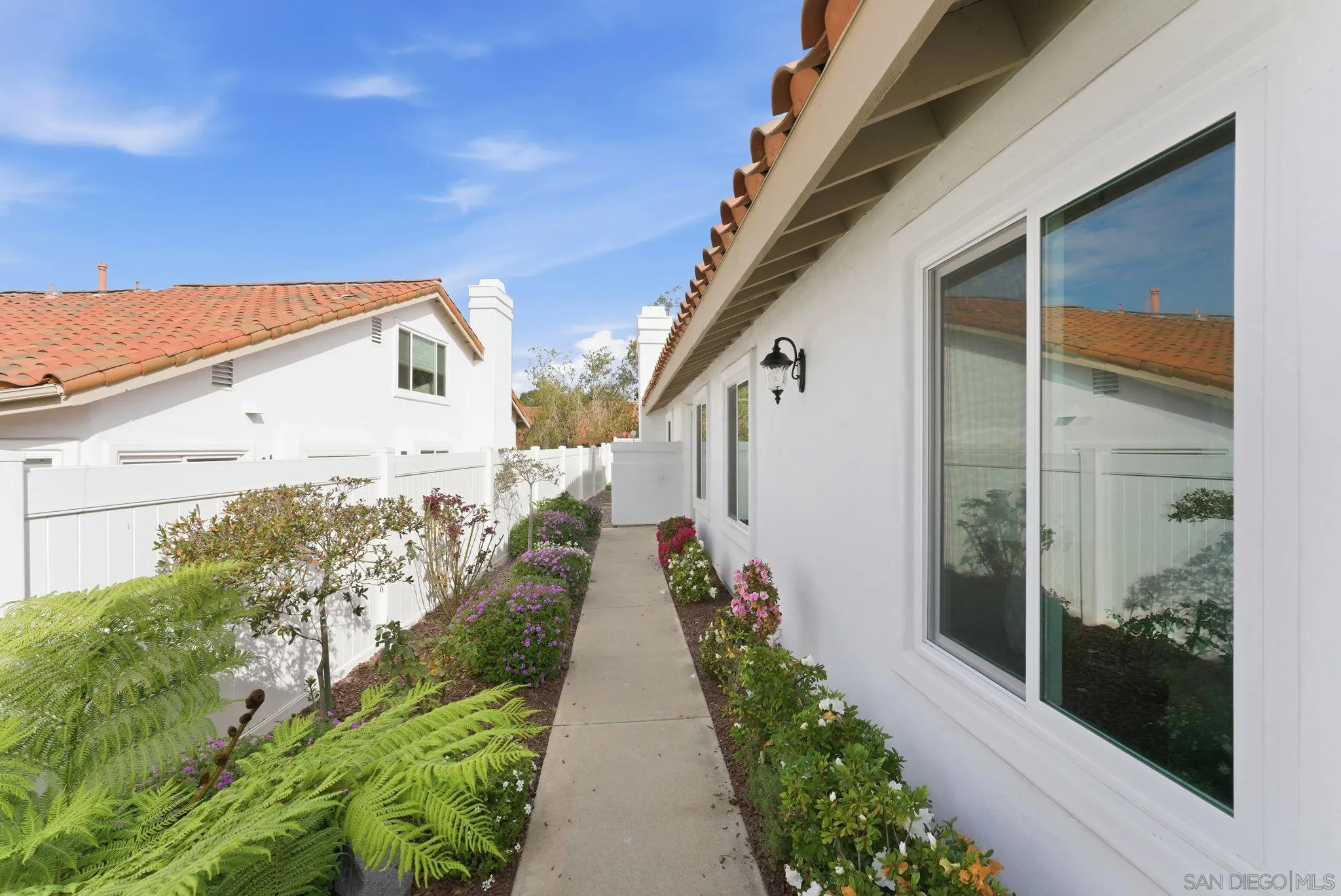 4744 Agora Way Oceanside, CA 92056 - Photo 27 of 31 a view of a pathway with a house in the background