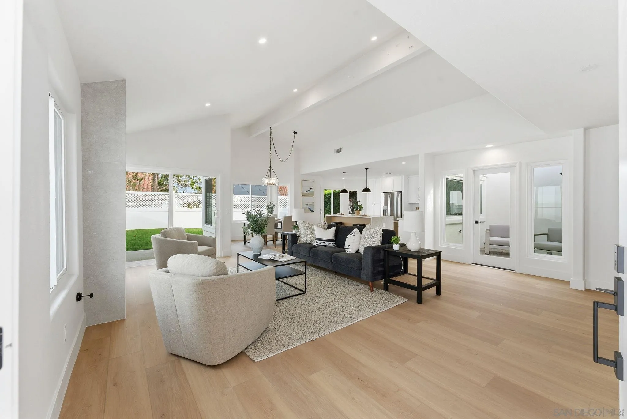 4744 Agora Way Oceanside, CA 92056 - Photo 6 of 31 a living room with furniture and a table