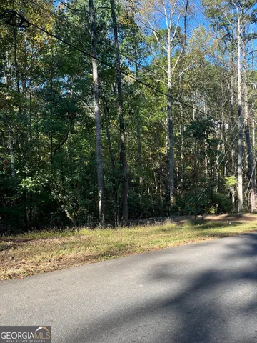 a view of swimming pool with an outdoor space and seating area
