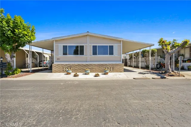 a view of a house with a street