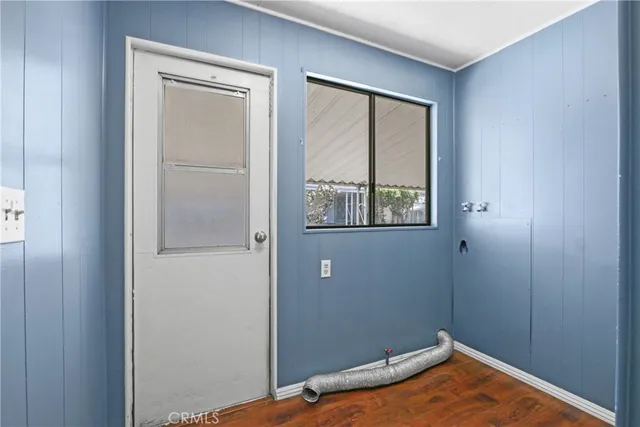 a view of a room that has a window