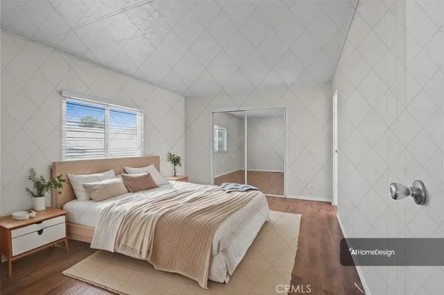 a bedroom with a bed and window