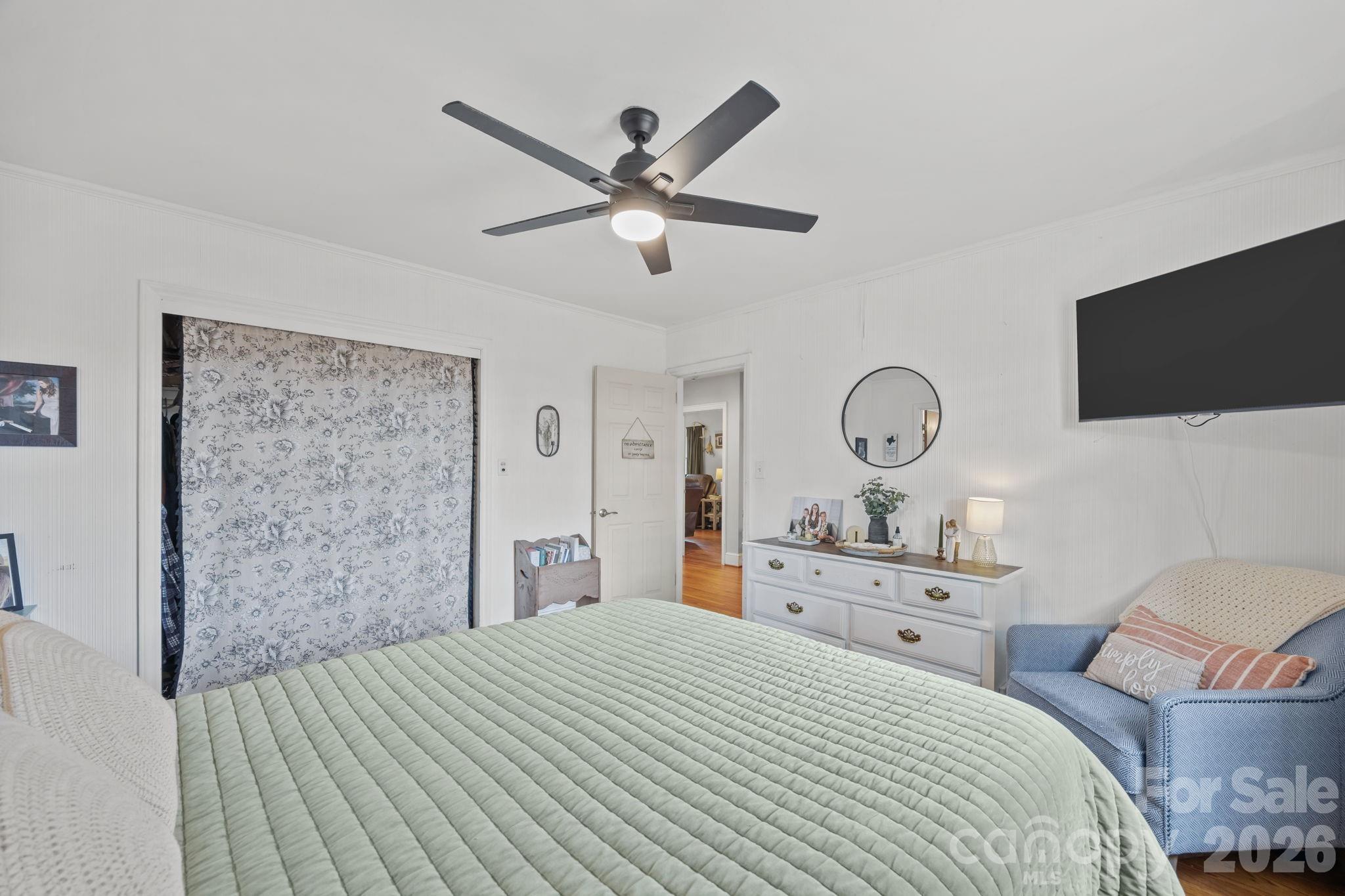275 Tanner Street Rutherfordton, NC 28139 - Photo 30 of 44 a bedroom with a bed and a flat screen tv