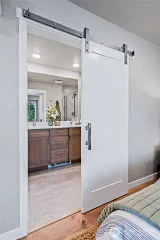 a bathroom with a sink and mirror