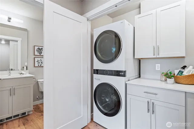 a view of a kitchen with washer and dryer